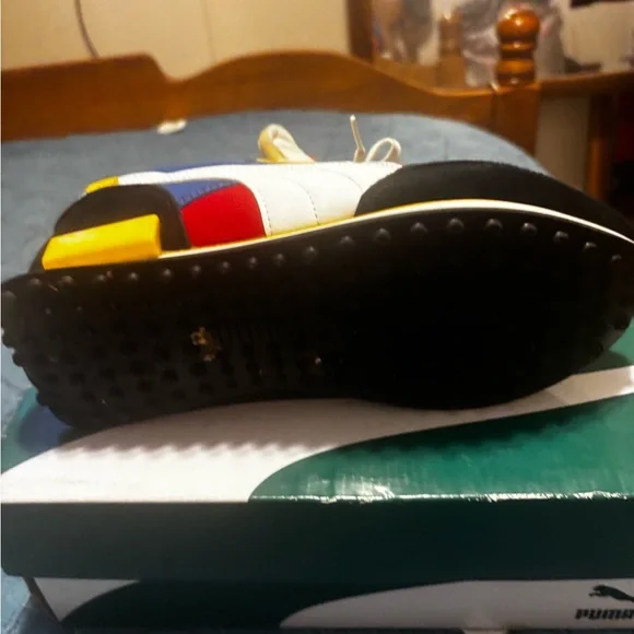 Puma Red, Blue, and Yellow Sneakers. Big kids size 7 fits women’s 8.5 or 9. - Picture 4 of 5